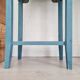 Blue wooden bedside tables with floral patterns