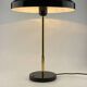 Rare black and gold UFO table lamp by Louis Kalff for Philips.
