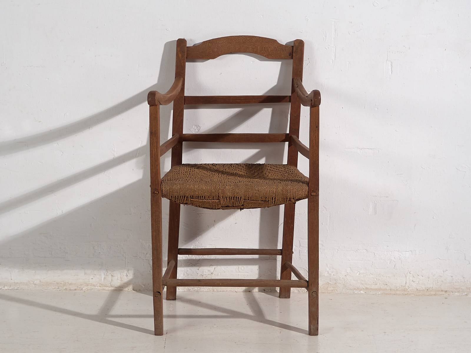 Two oak and rope armchairs, circa 1900