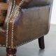 Fauteuil Chesterfield en cuir de vachette grainé marron couleur cognac