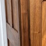 Empire wardrobe in solid walnut, France, mid-19th century.