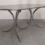 Chrome metal and smoked glass dining table, Italy circa 1970.