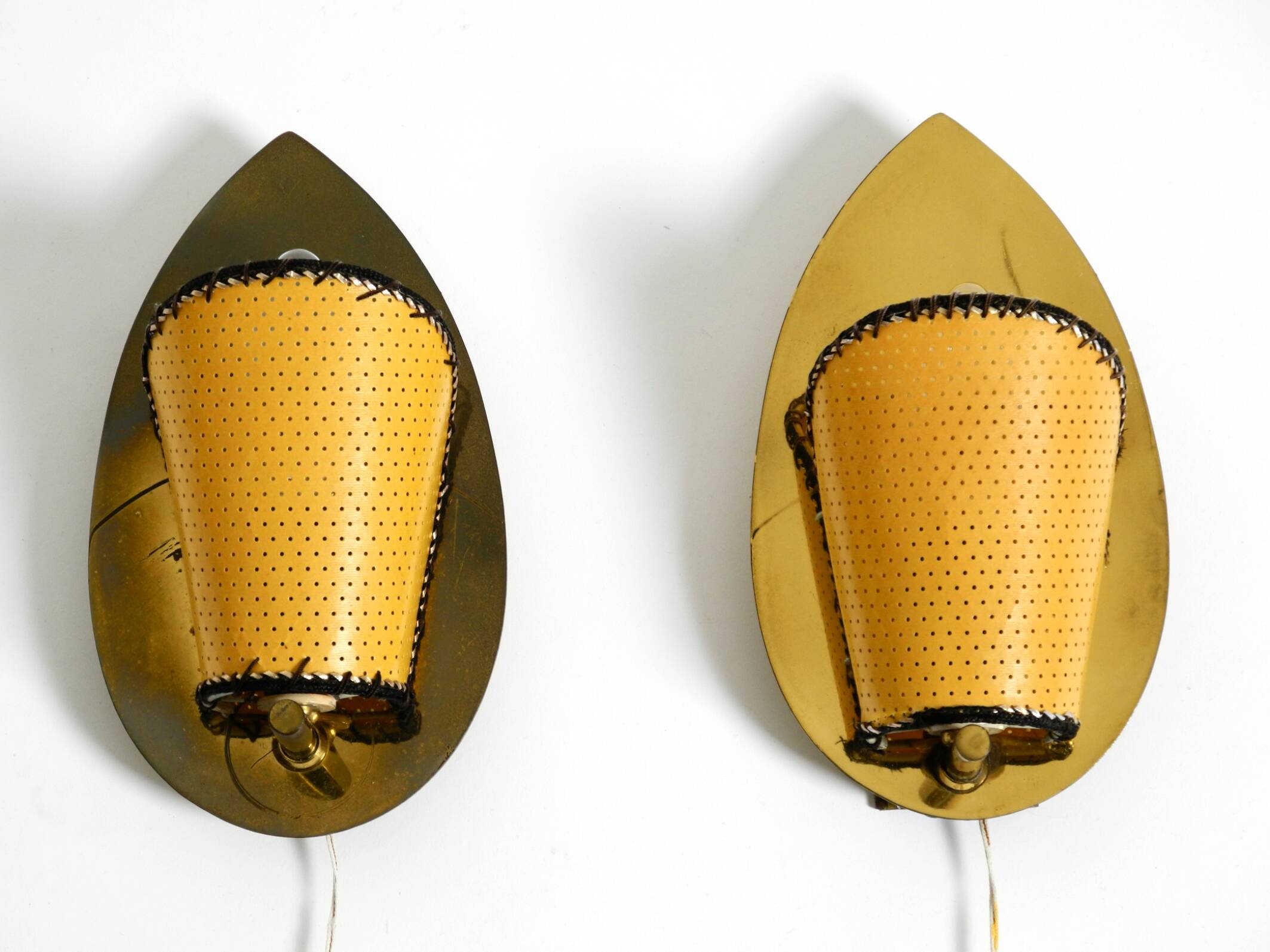 Two enchanting original Mid Century Modern brass wall lamps