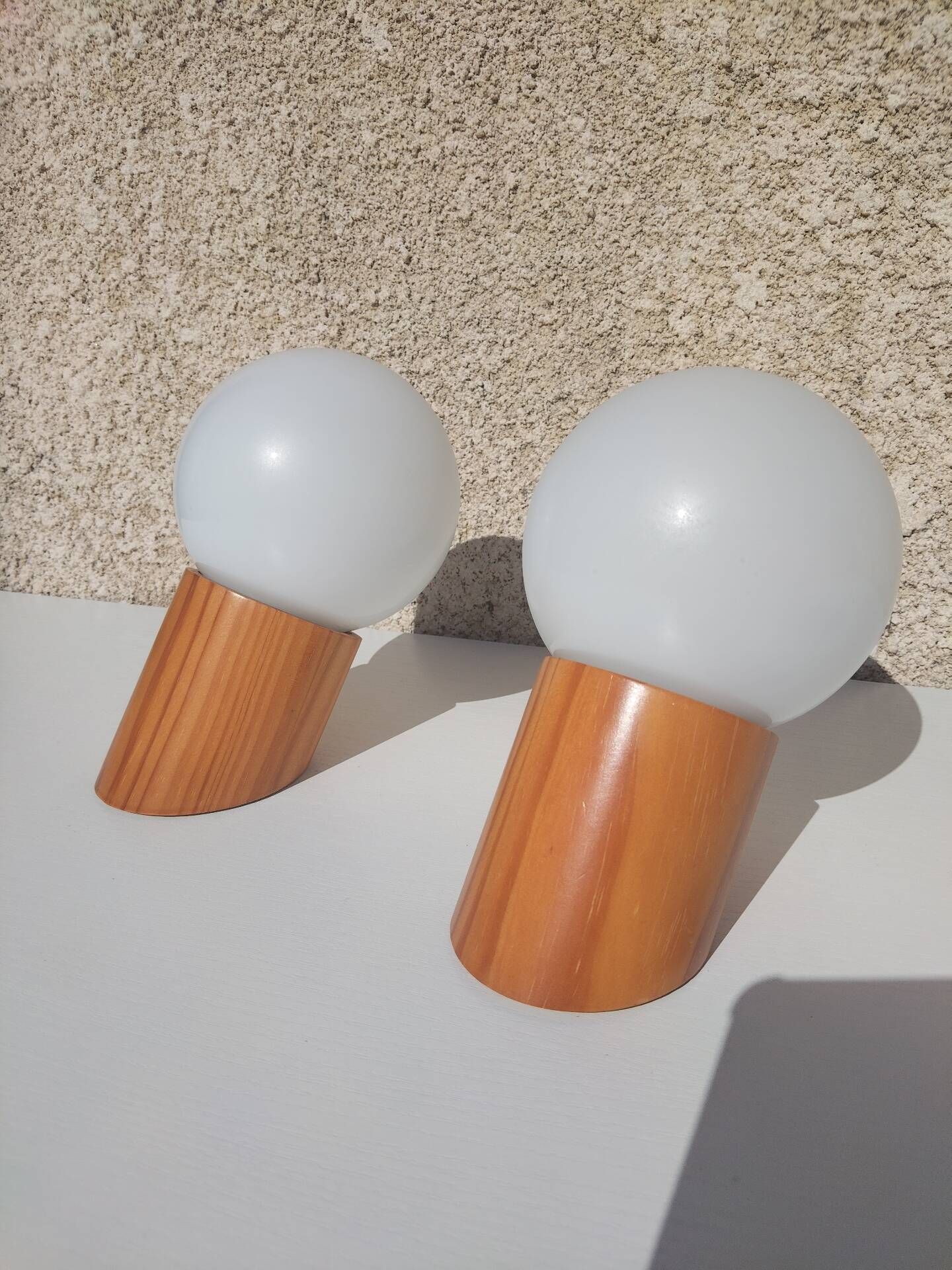 Pair of vintage wall lights in varnished pine and opal glass, 1970s-80s.