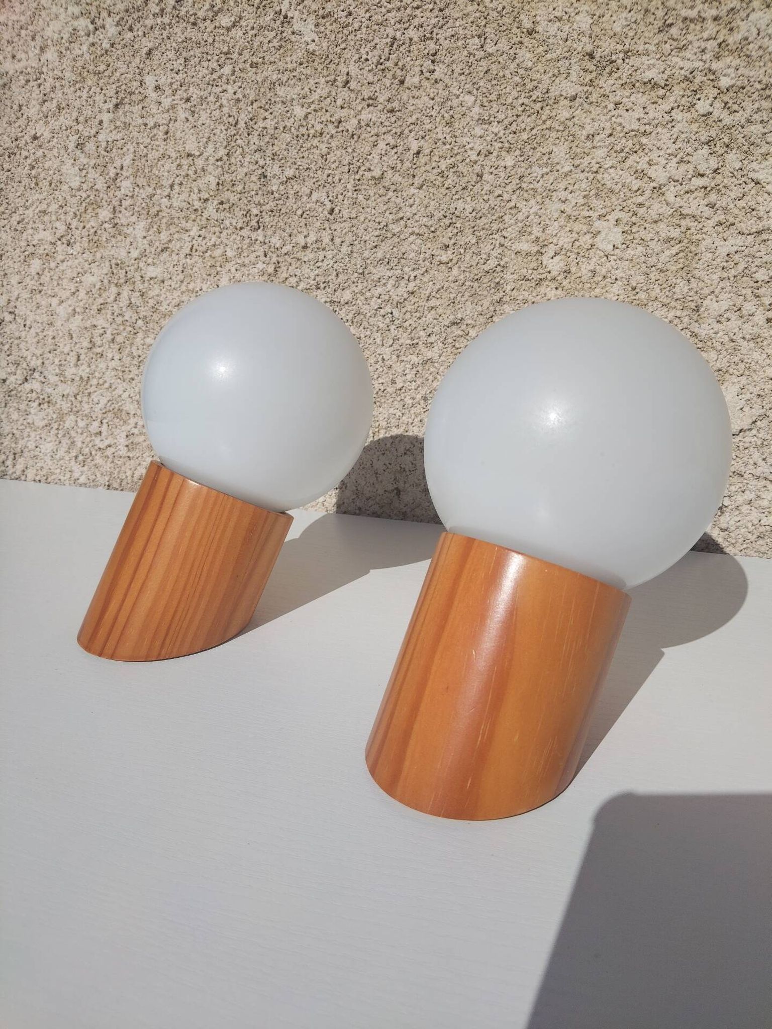 Pair of vintage wall lights in varnished pine and opal glass, 1970s-80s.