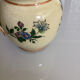 Old ceramic jug with floral decoration
