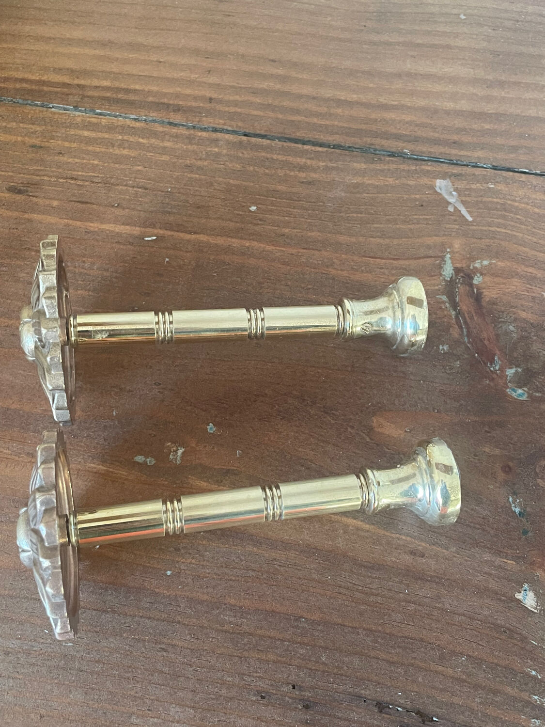 2 golden brass hooks with flower curtain tiebacks