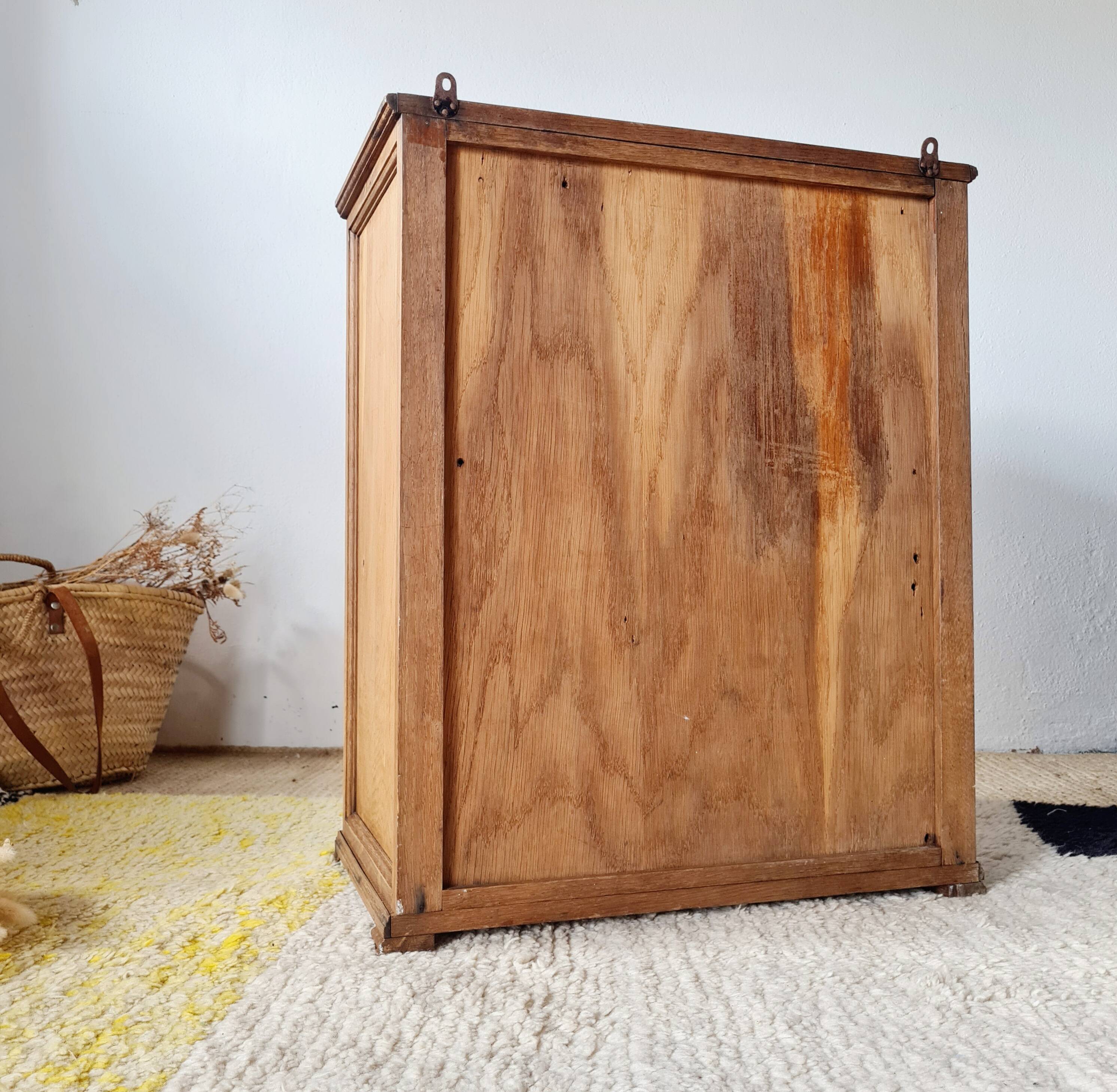 Small Parisian oak wardrobe with its porcelain knob.