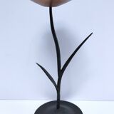 Pair of flower-shaped candlesticks in black metal and copper