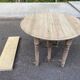 Round extendable dining table with flaps, stripped in raw oak, with 3 extensions.