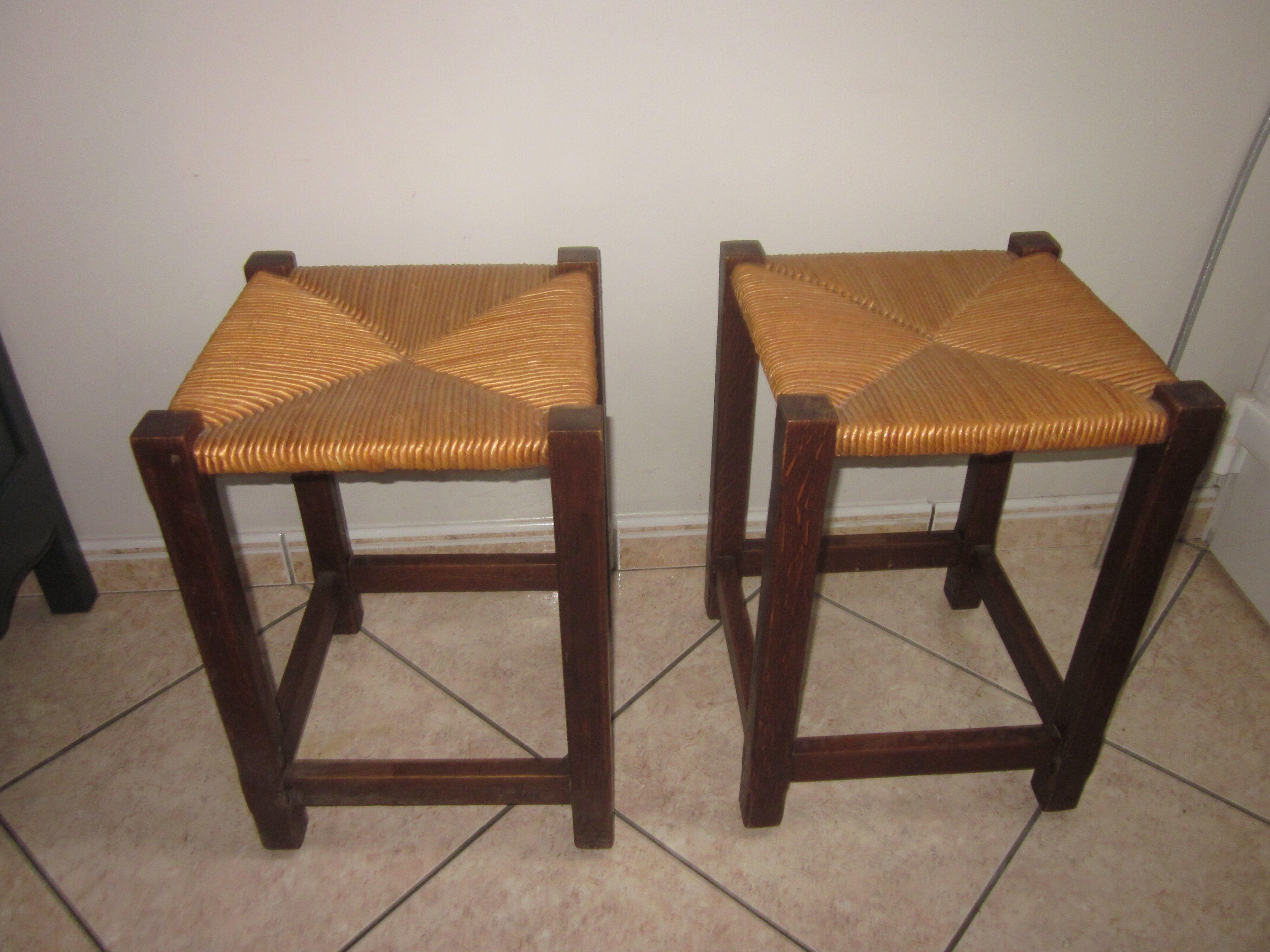 Pair of wooden and straw stools