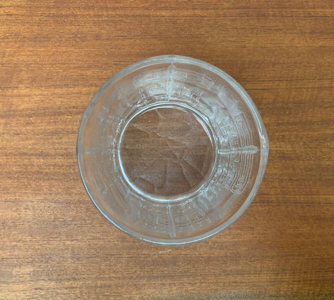 Large vintage glass vase or bowl with South American/Inca ornaments.