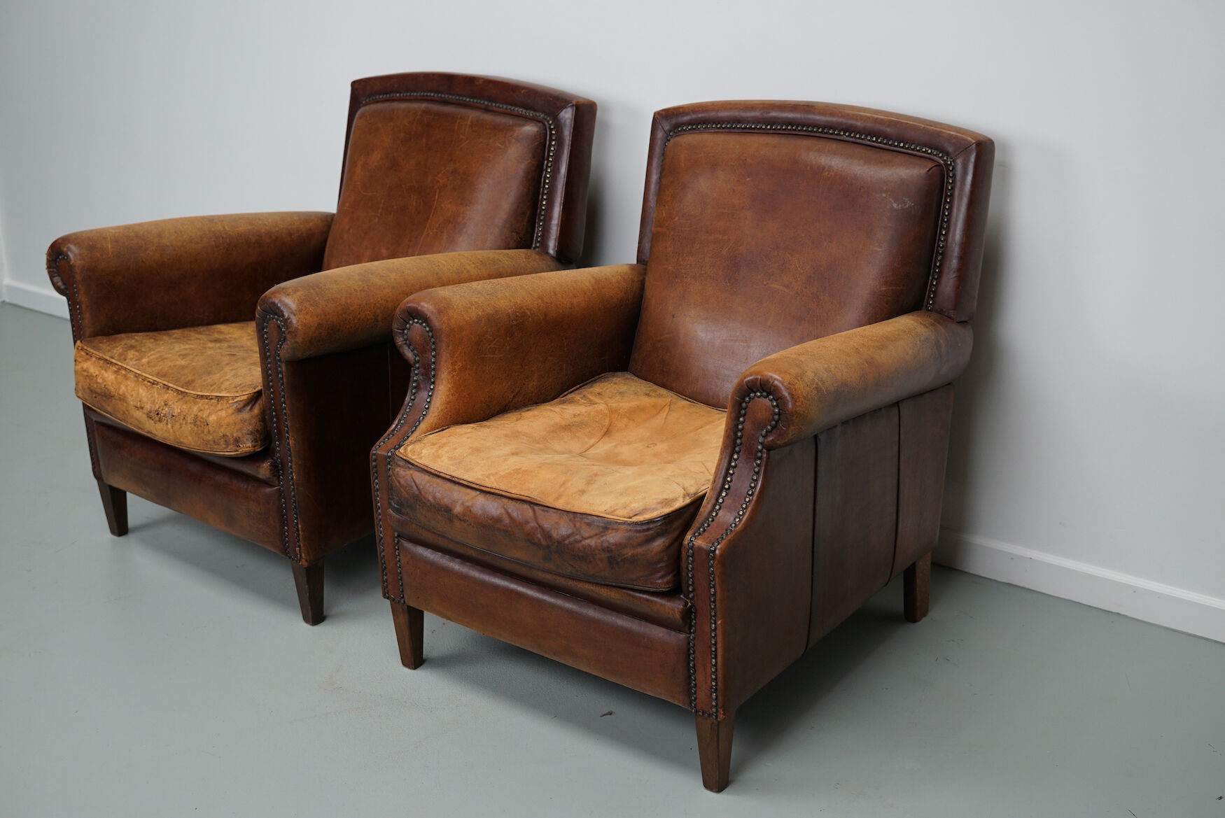 Vintage dutch cognac colored leather club chairs