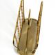 Rare Mid Century Modern magazine rack made of solid brass and genuine bambo