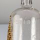 French Art Nouveau Uranium Glass Bottle with Applied Amber Leaves, c. 1900