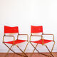 Red vintage pair of lafuma folding chairs