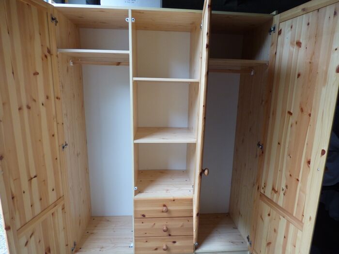 Wardrobe three doors, one with mirror, three drawers in solid pine wood