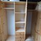 Wardrobe three doors, one with mirror, three drawers in solid pine wood