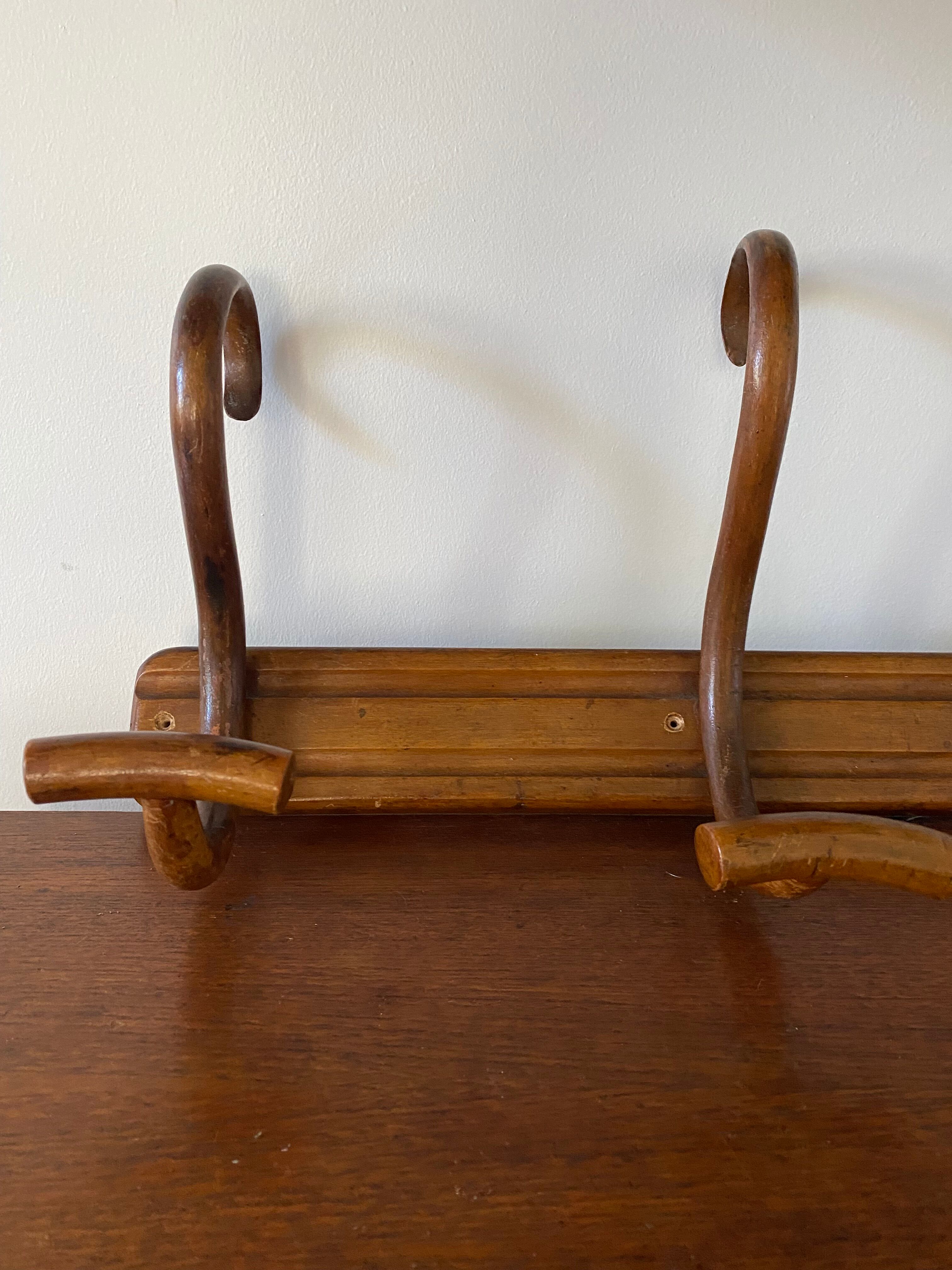 Wooden coat rack turned upside down