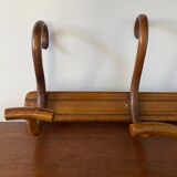 Wooden coat rack turned upside down