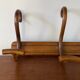 Wooden coat rack turned upside down