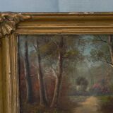 Peinture ancienne paysage sous bois signé.