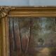 Old signed landscape painting under wood.