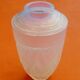 Opalescent glass vase in the shape of an urn Decorated with foliage and berries