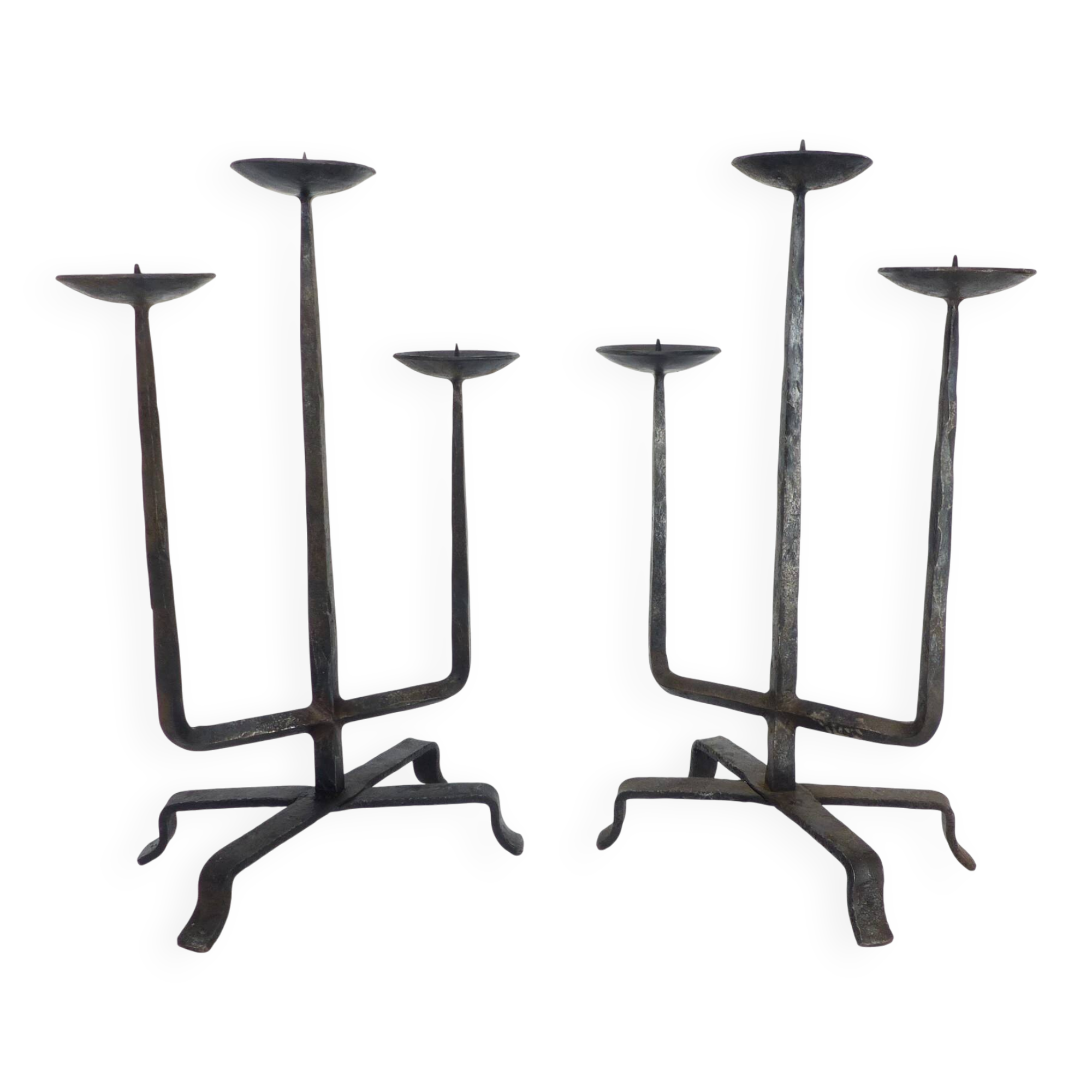 Pair of brutalist wrought iron candlesticks, France, three lights, signed