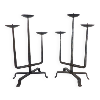 Pair of brutalist wrought iron candlesticks, France, three lights, signed