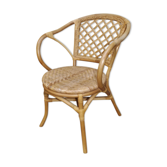 Fauteuil en rotin à assise cannée circa 1970