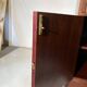 Antique mahogany secretary, upholstered flap and interior storage