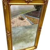 19th century style gilded wooden beveled mirror with ornate corners