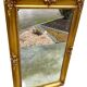 Miroir biseauté en bois doré