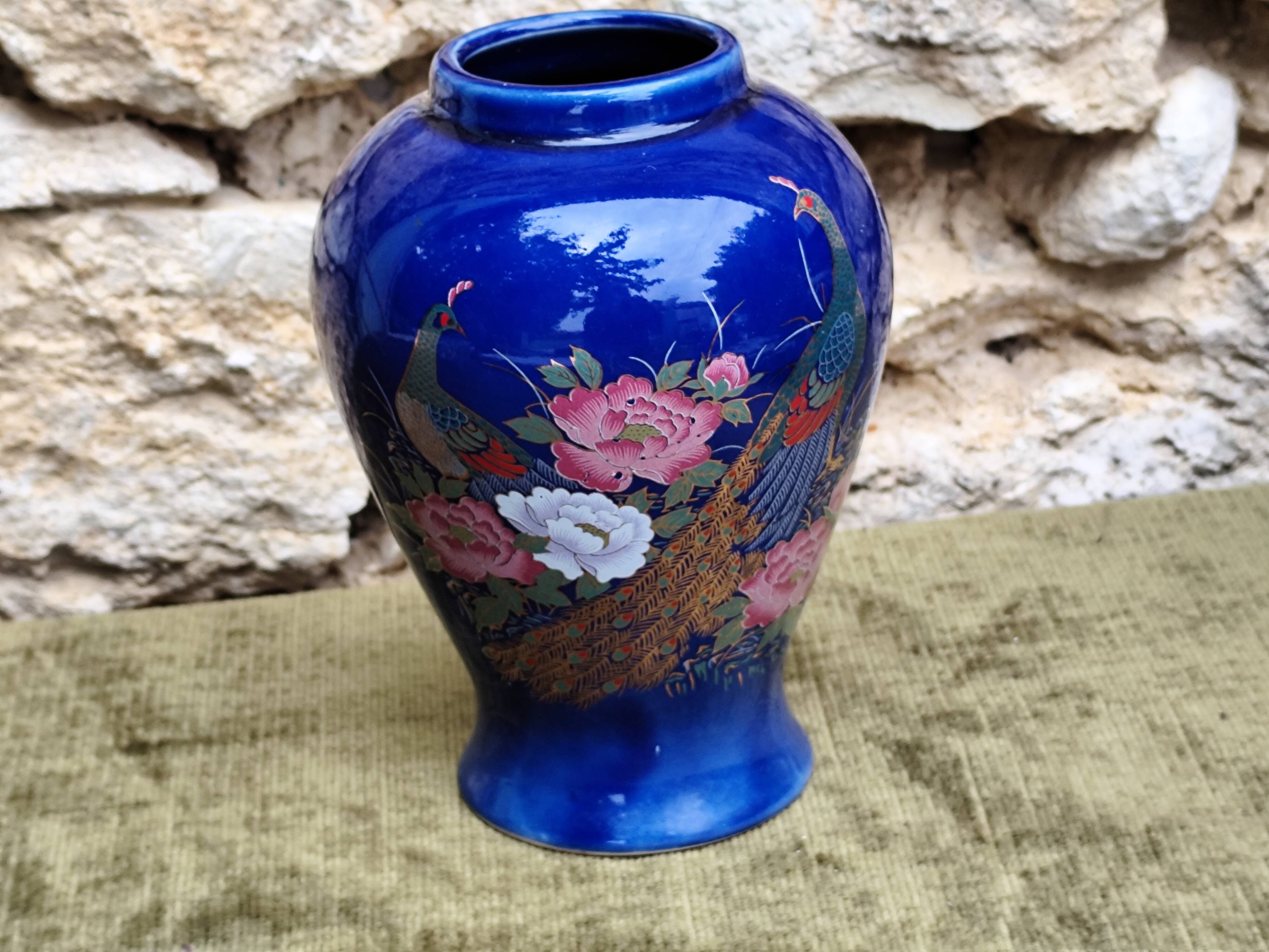 Peacock ceramic vase