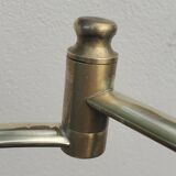 brass floor lamp with articulated reading arm 1970 and its red lampshade
