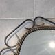 Mid-century modern iron mirror, brutalist, vintage organic, thick sixties.