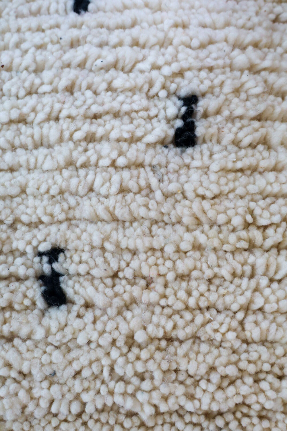 Moroccan Berber white pouf with bohemian polka dots