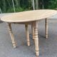 Round dining table with extendable leaves, Louis Philippe style, stripped in raw oak.