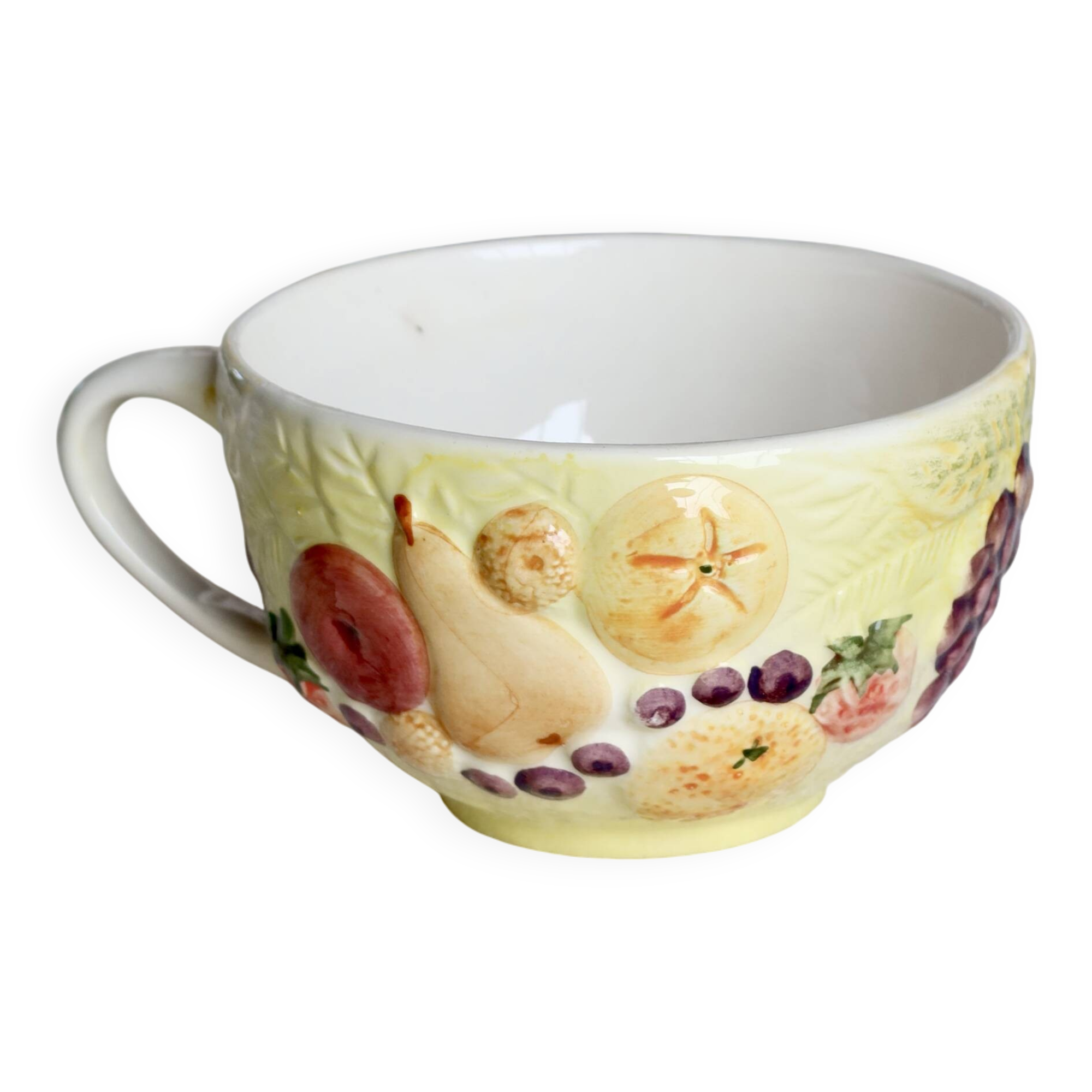 Large vintage earthenware mug with fruit motif and slip details