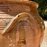 Ancient terracotta pottery jar