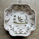 Moustiers salad bowl in cream and green earthenware, 18th century.