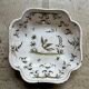 Moustiers salad bowl in cream and green earthenware, 18th century.