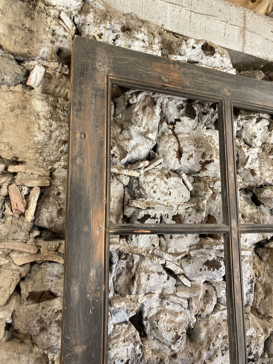 Old glazed wooden door patinated