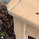 Art Deco farmhouse table made of raw wood.