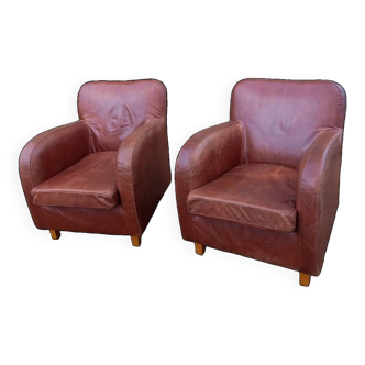 Paire de fauteuils club en cuir