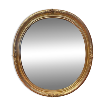 Miroir ovale biseauté bois doré style Louis XVI XIXe siècle