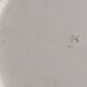 Large earthenware dish decorated with a parrot.