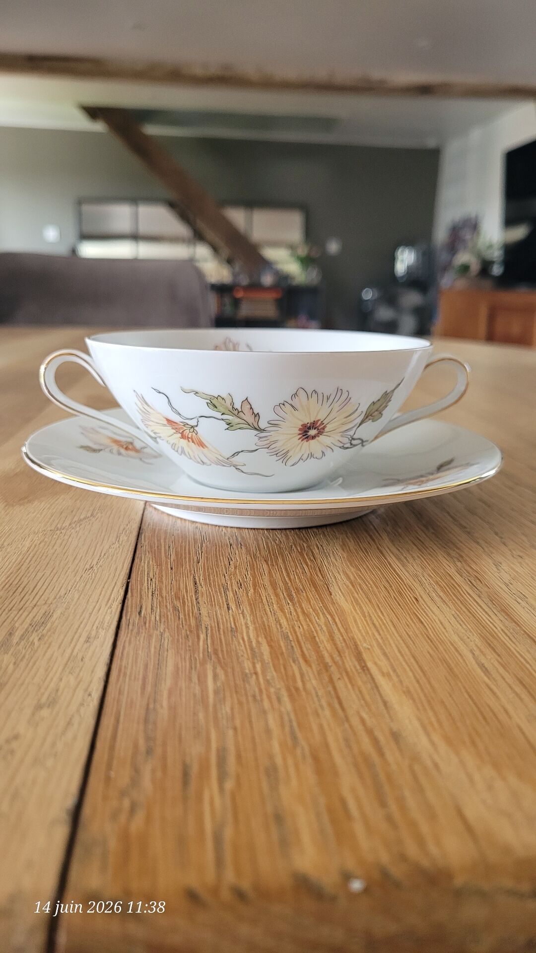 2 large antique cups and their saucers