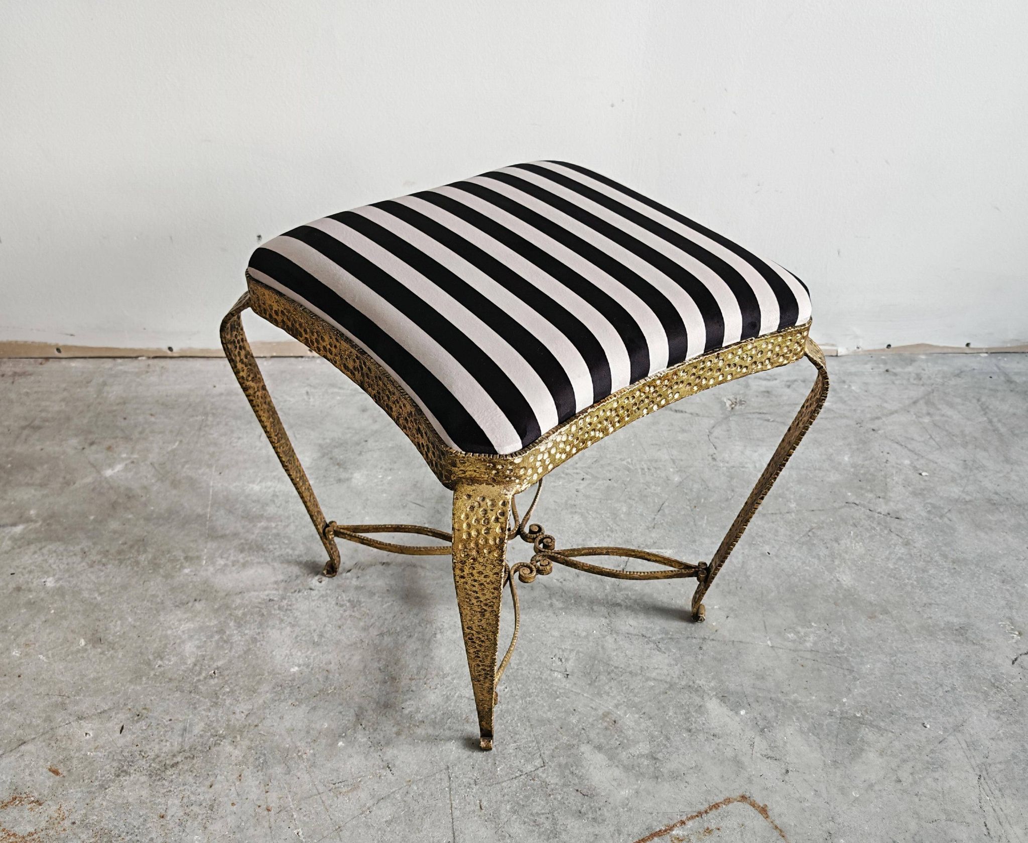Pair of Mid Century Modern ottomans by Pier Luigi Colli from the 1950s.